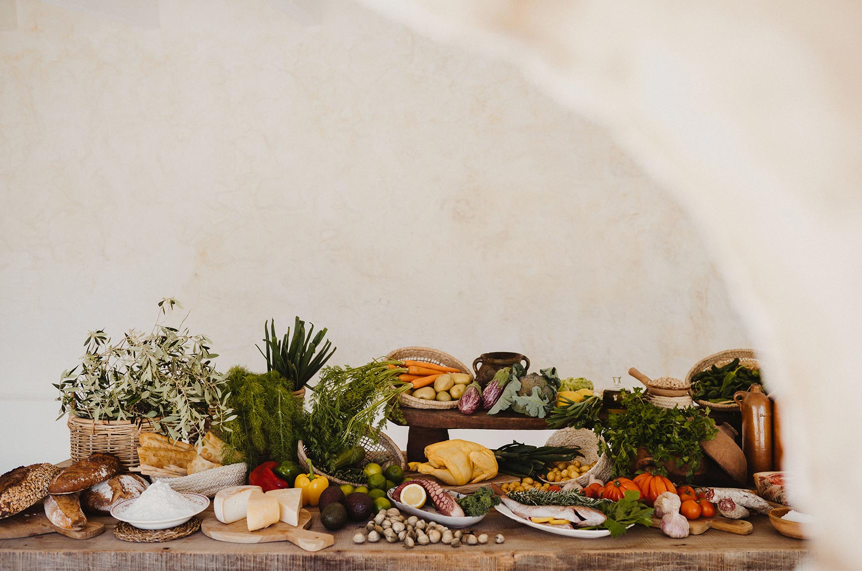 image of the table of fresh produce grown at Nonna Bazaar Restaurants Ciutadella